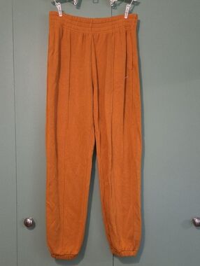 Nike Men's Casual Elastic-Waist Pants in Rust Orange Size Medium